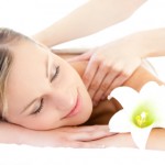 Relaxed woman receiving a back massage